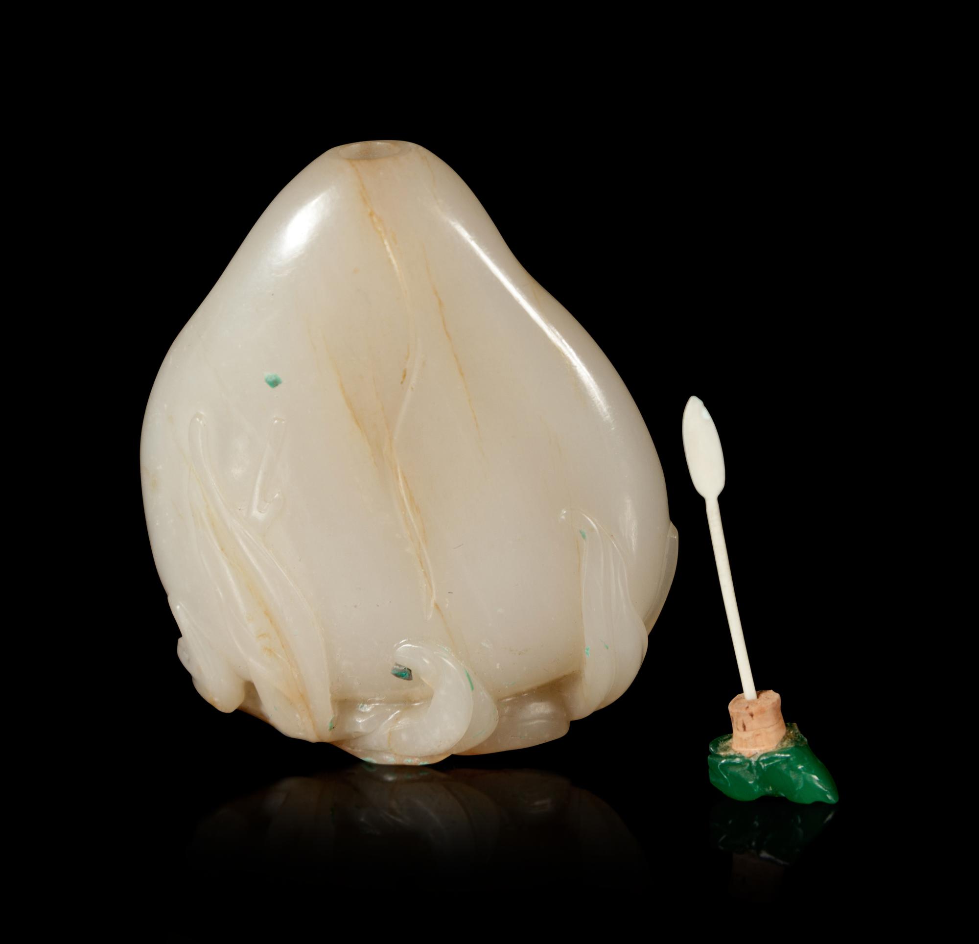 A Russet and White Jade 'Peach and Bat' Snuff Bottle