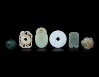 Six Chinese Carved Jade and Hardstone Pendants