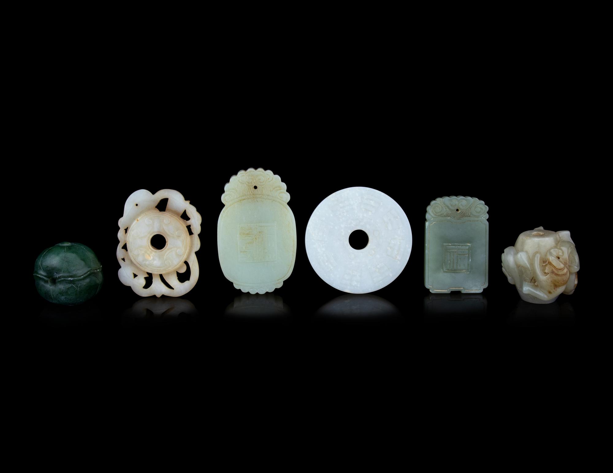 Six Chinese Carved Jade and Hardstone Pendants