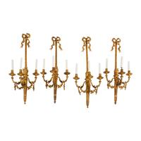 A Set of Four Louis XVI Style Gilt Bonze Three-Light Sconces
