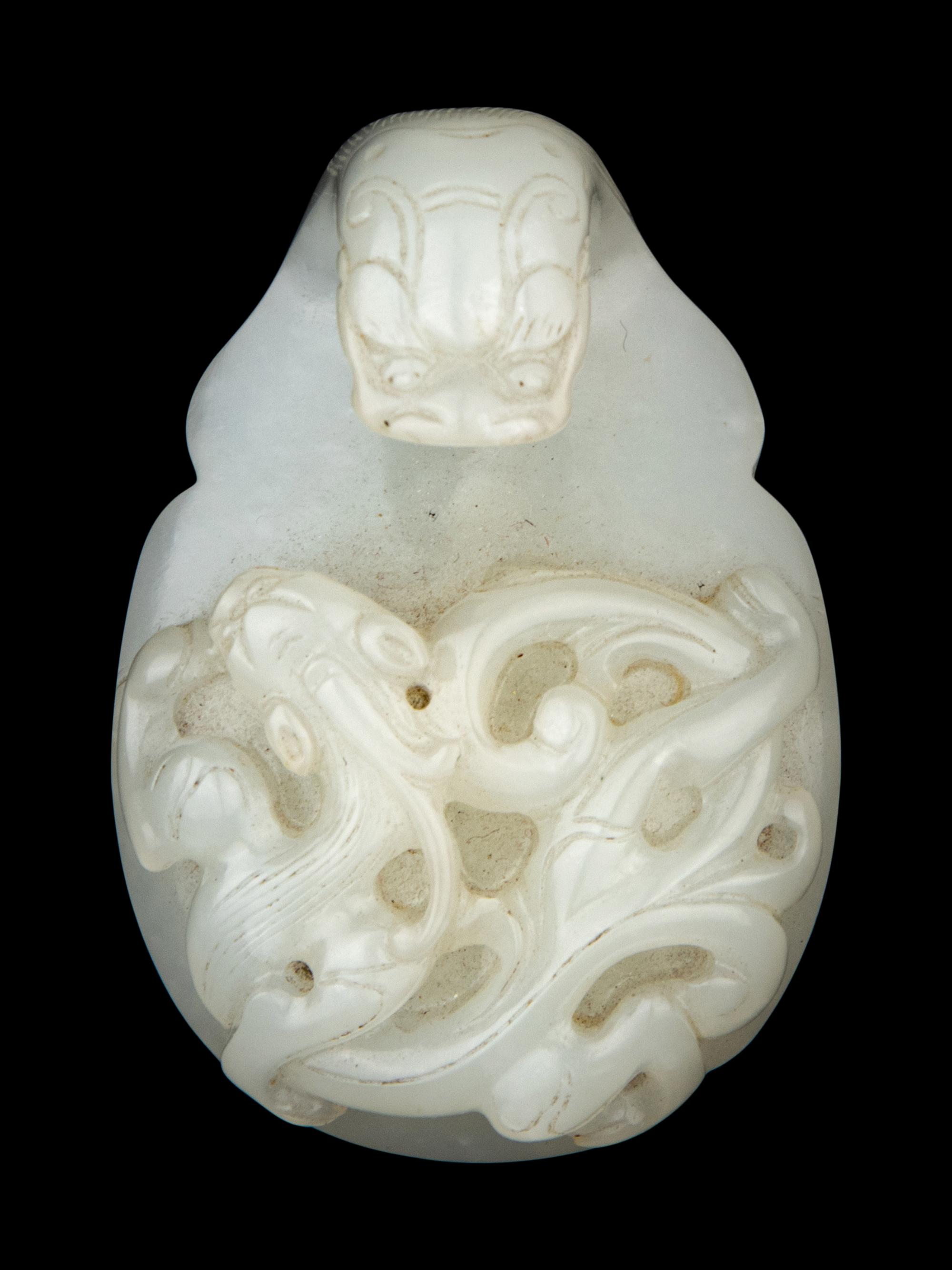 A Chinese White Jade 'Chilong' Belt Hook