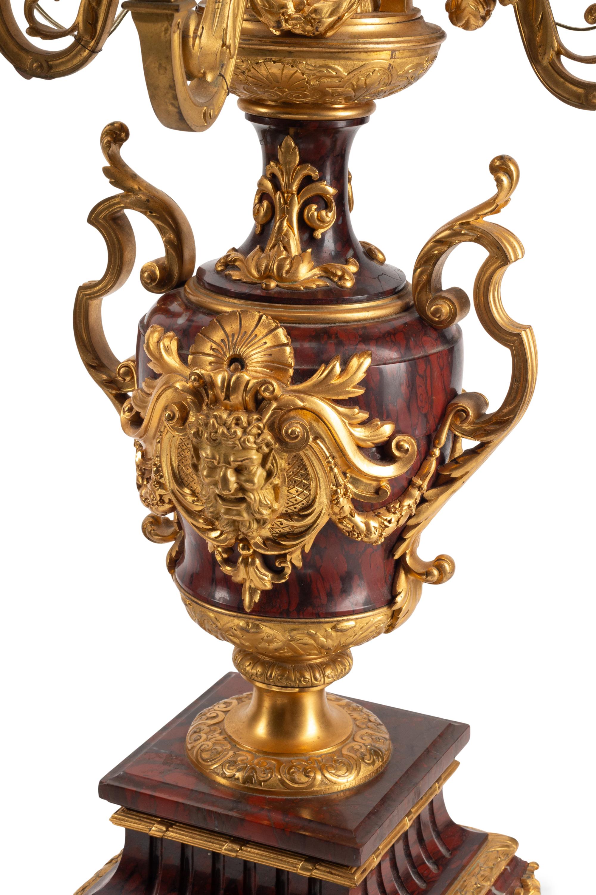 A Pair of Napoleon III Gilt Bronze and Rouge Griotte Marble Nine-Light Candelabra