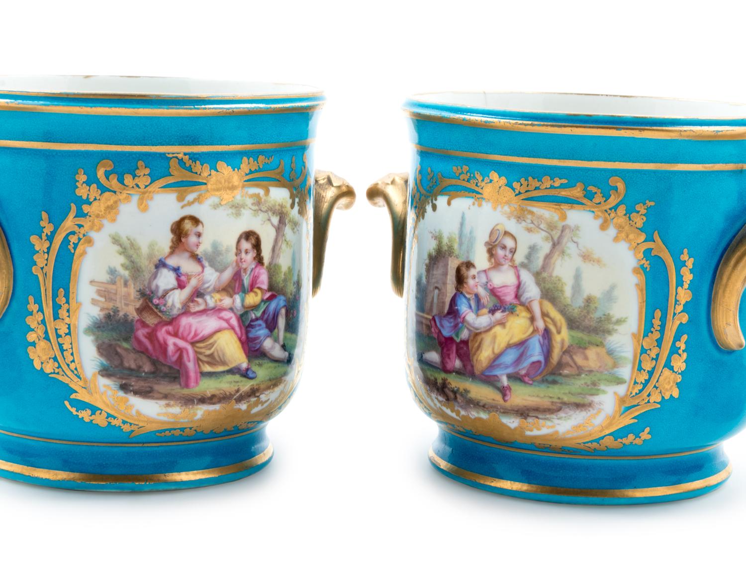 Two Pairs of Sèvres Style Celeste Blue-Ground Porcelain Table Articles