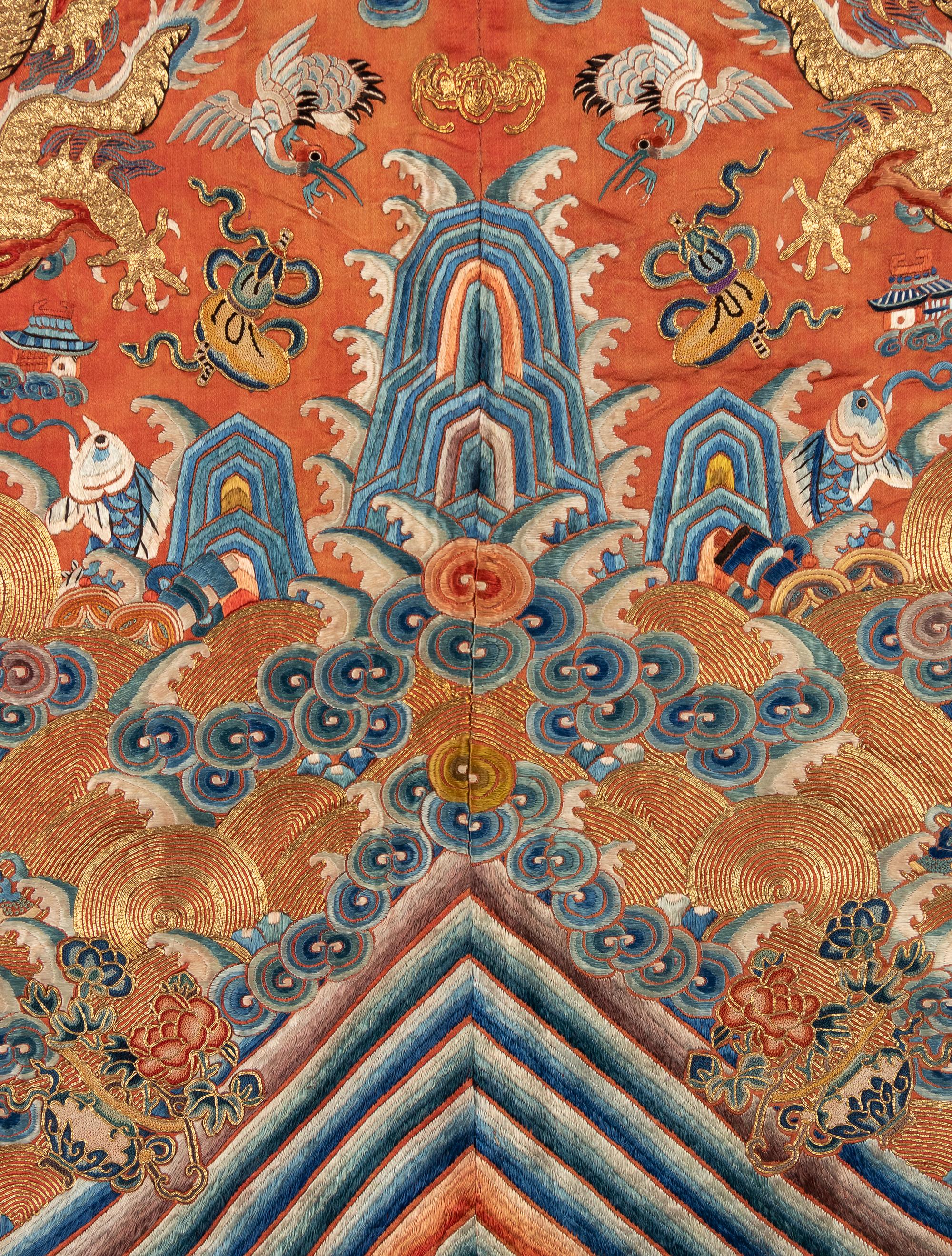 A Apricot Ground Embroidered Silk 'Dragon' Robe, Jifu