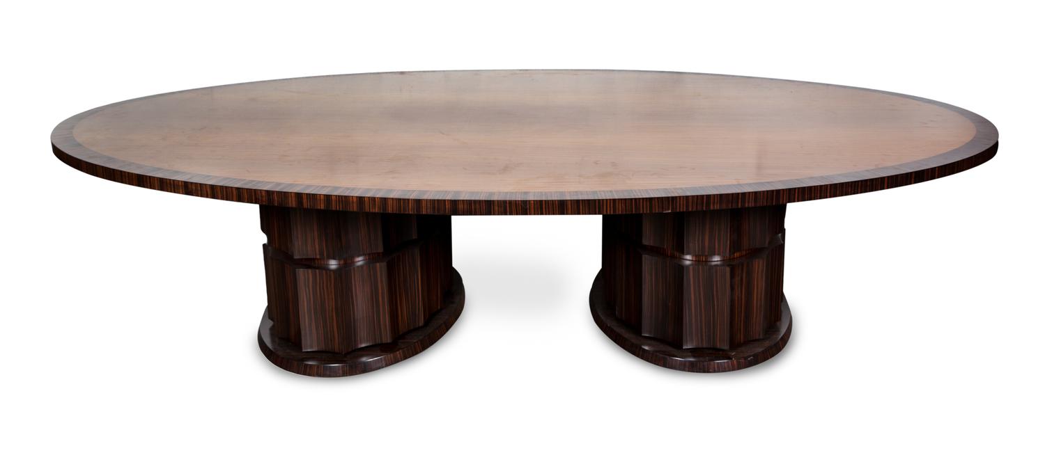 An Art Deco Style Palisander and Satinwood Pedestal Dining Table Height 29 x width 124 x depth 70 inches. — 20TH CENTURY