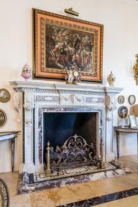 A Pair of Continental Gilt Bronze Chenets and an Associated Fire Screen