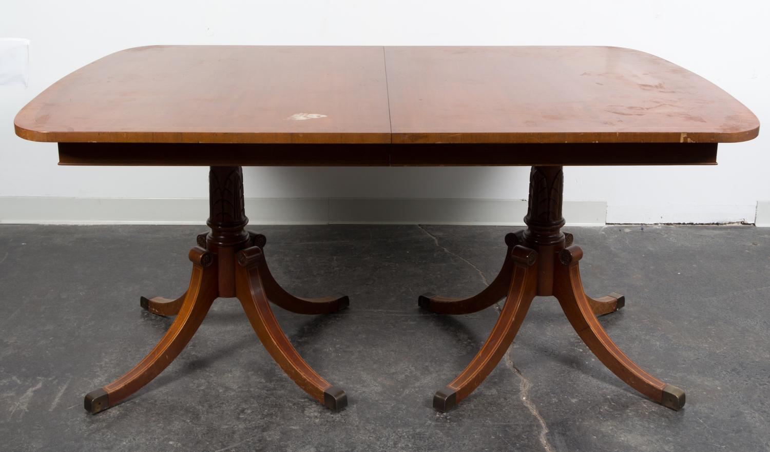 A Georgian Style Double Pedestal Table Height 29 3/4 x length 64 x depth 42 inches. — 20TH CENTURY