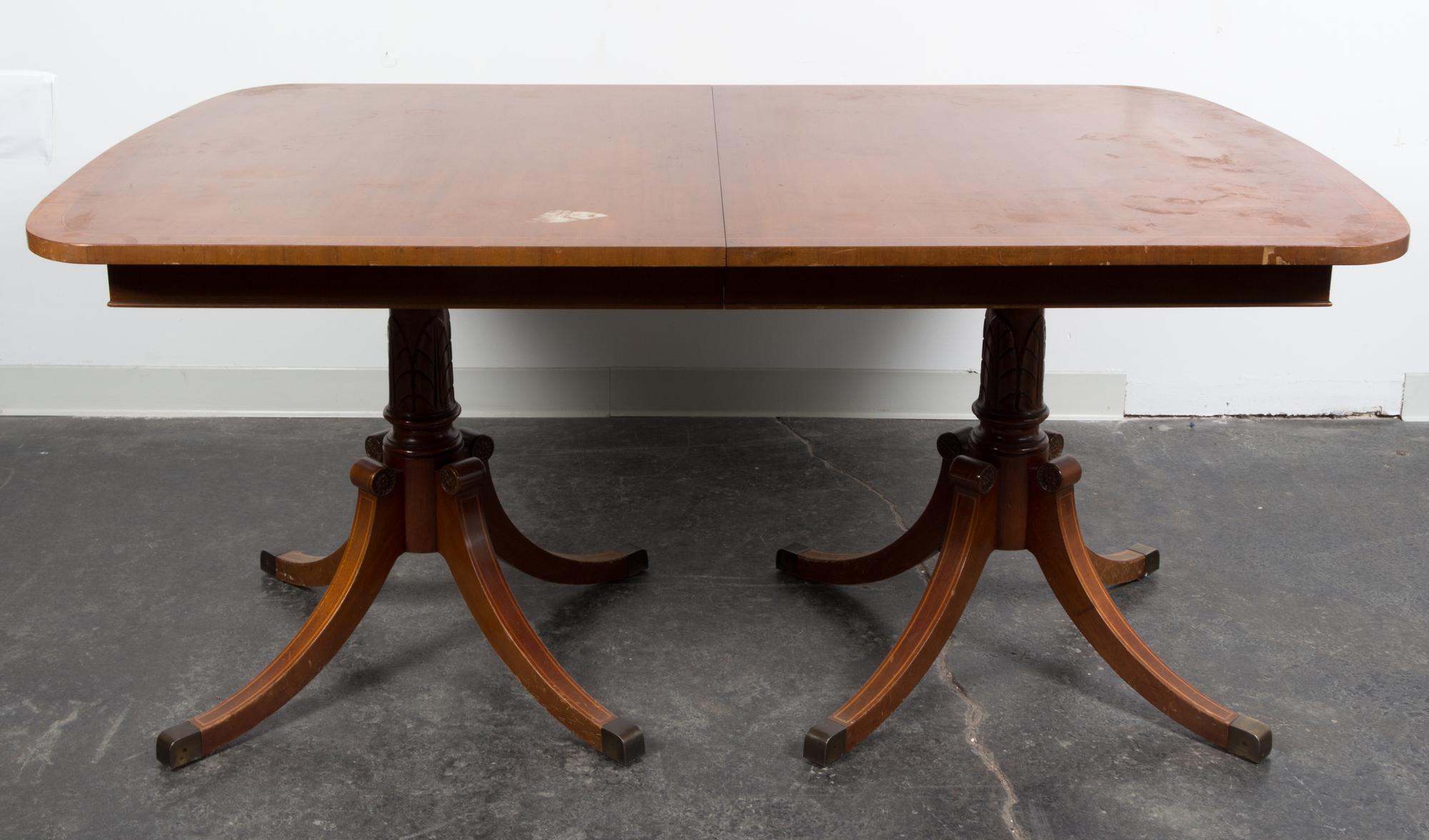 A Georgian Style Double Pedestal Table Height 29 3/4 x length 64 x depth 42 inches. — 20TH CENTURY