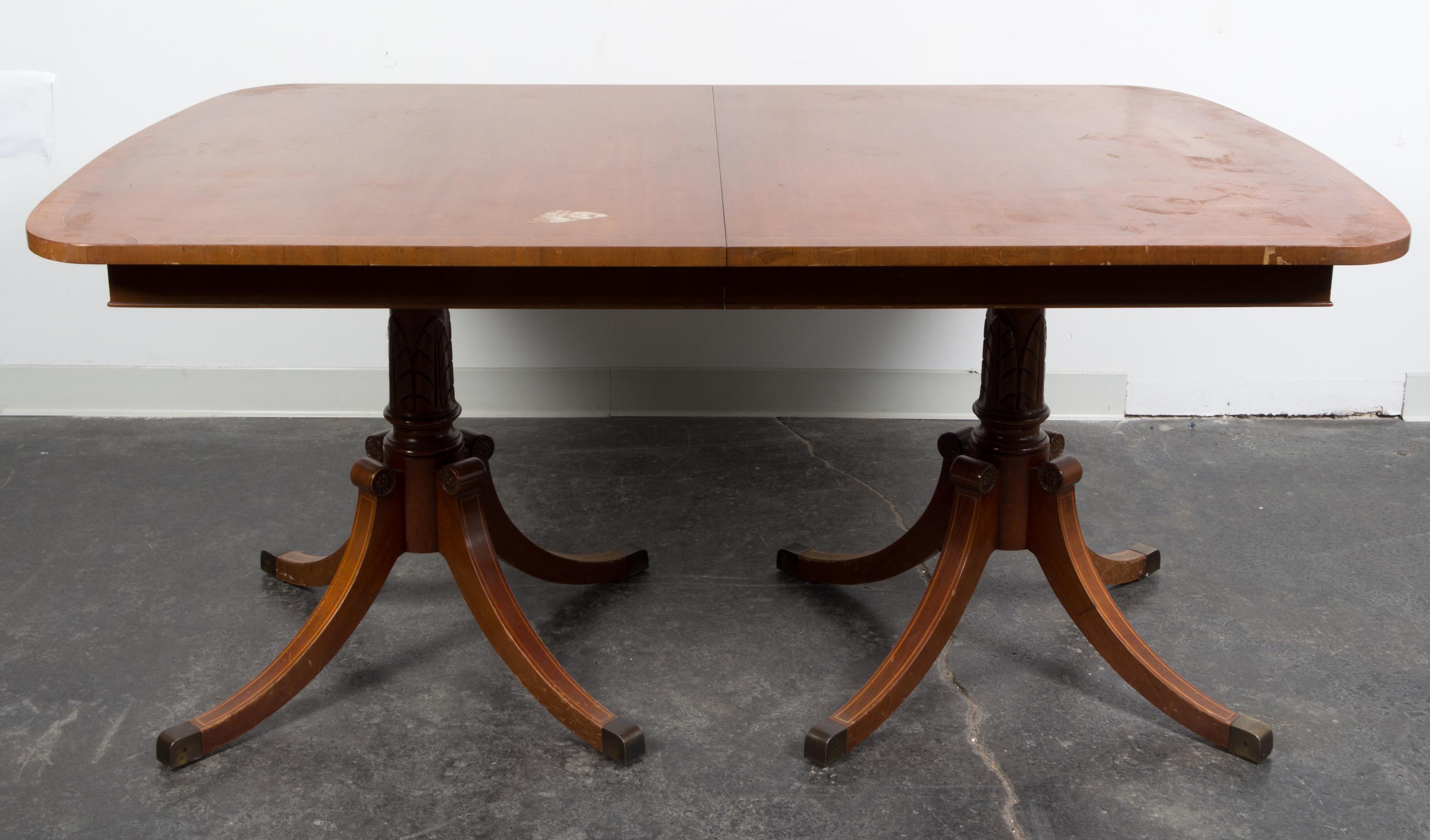 A Georgian Style Double Pedestal Table Height 29 3/4 x length 64 x depth 42 inches. — 20TH CENTURY