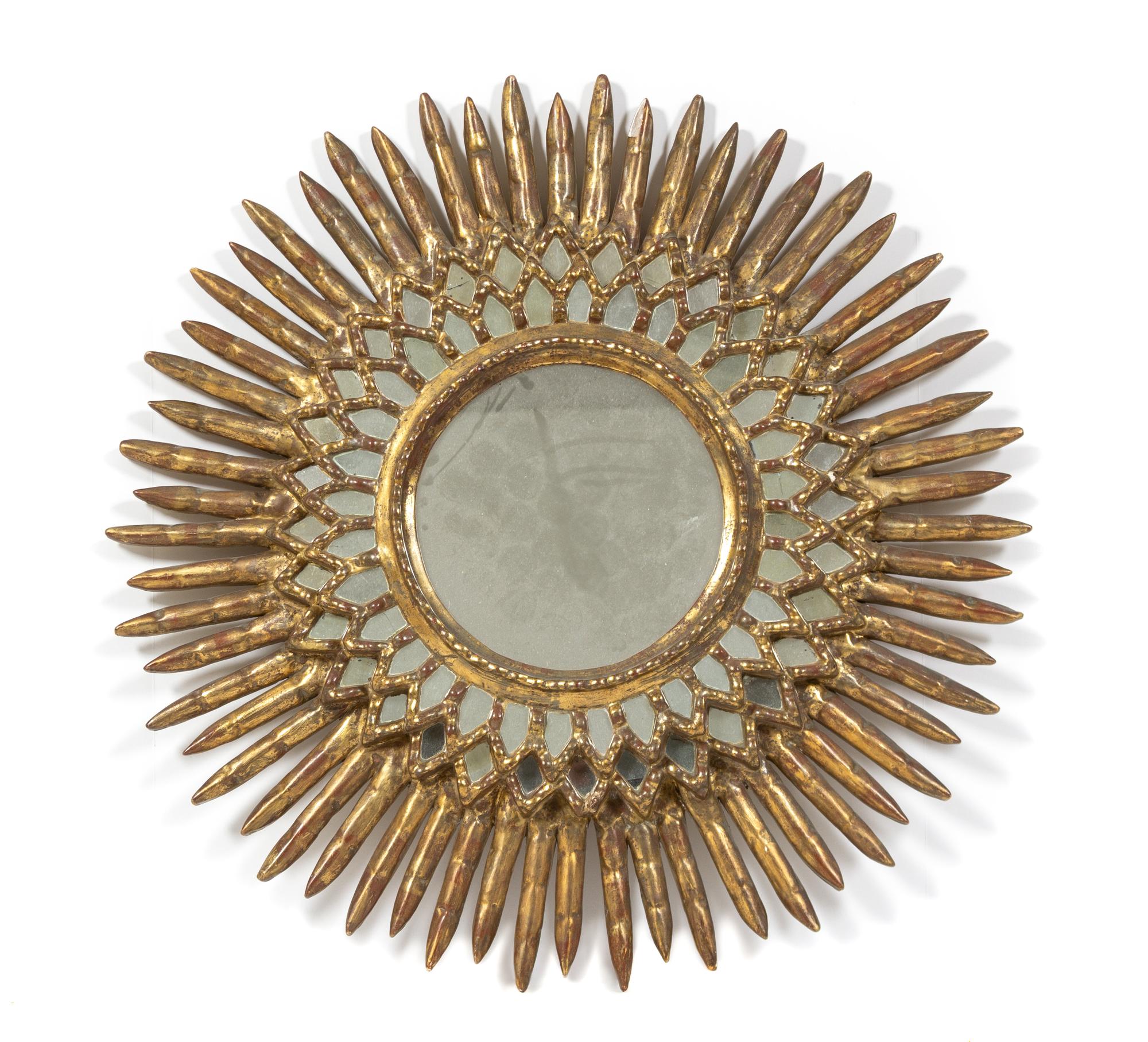A Moroccan Giltwood Mirror Diameter 29 inches. — 20TH CENTURY
