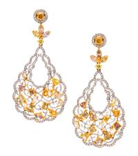 A Pair of 18 Karat Bicolor Gold, Colored Diamond and Diamond Earclips, 15.40 dwts.