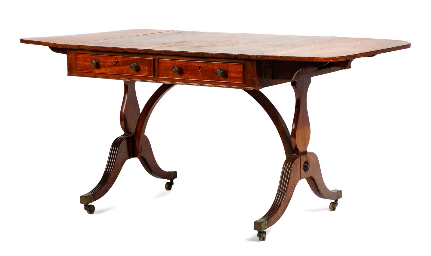 An English Mahogany Drop-Leaf Sofa Table Height 28 1/2 x width 36 1/2 x depth 31 inches (closed). — 19TH CENTURY