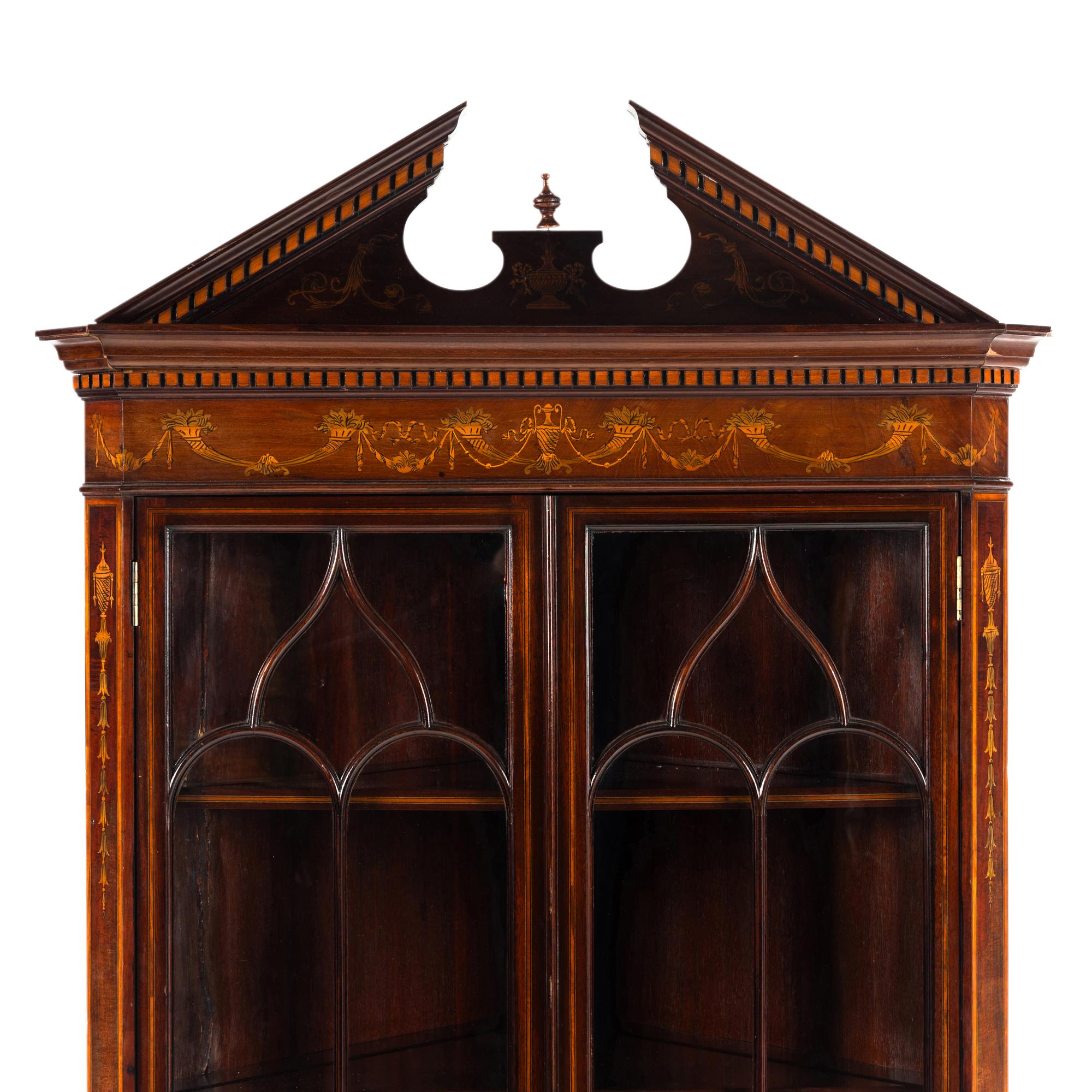 An Edwardian Fruitwood- Inlaid Mahogany Corner Cupboard