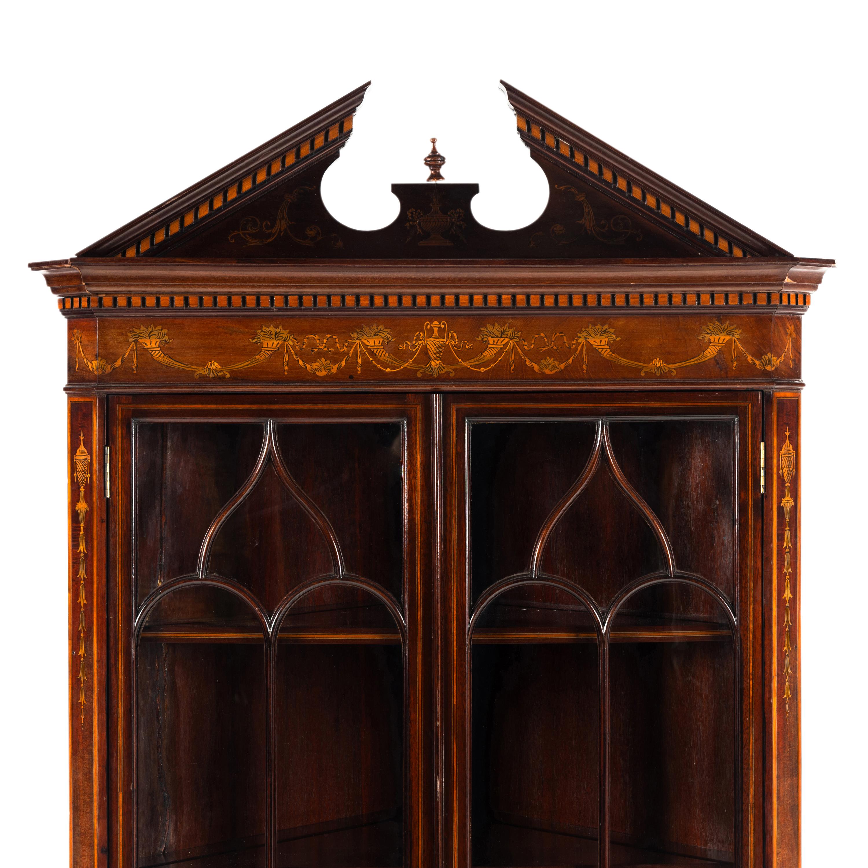 An Edwardian Fruitwood- Inlaid Mahogany Corner Cupboard