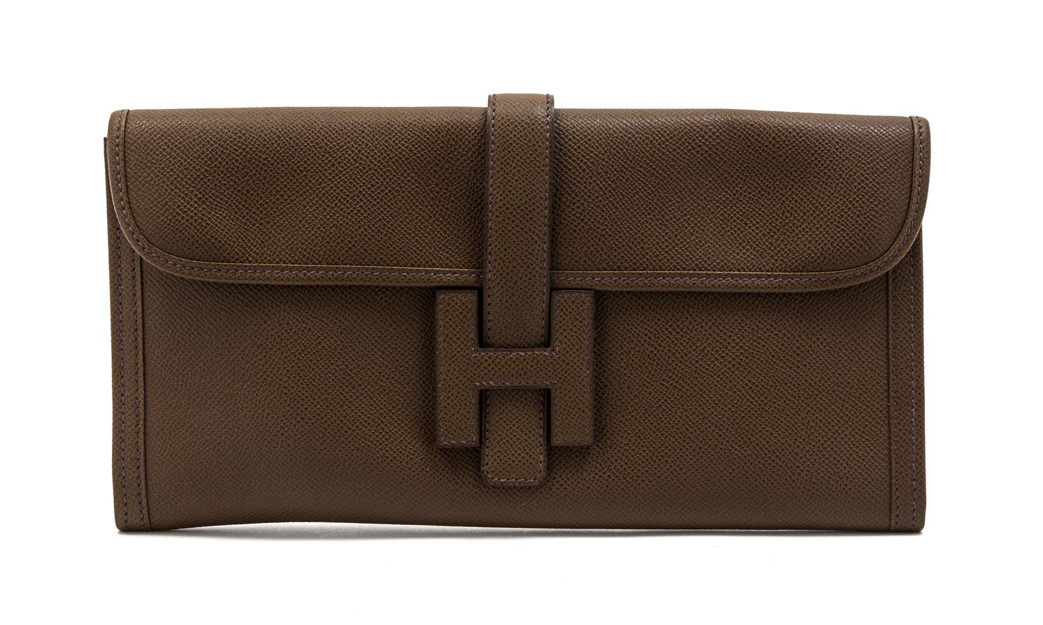 An Hermes Brown Leather Jige Clutch, 11 x 6 x 1 inches.
