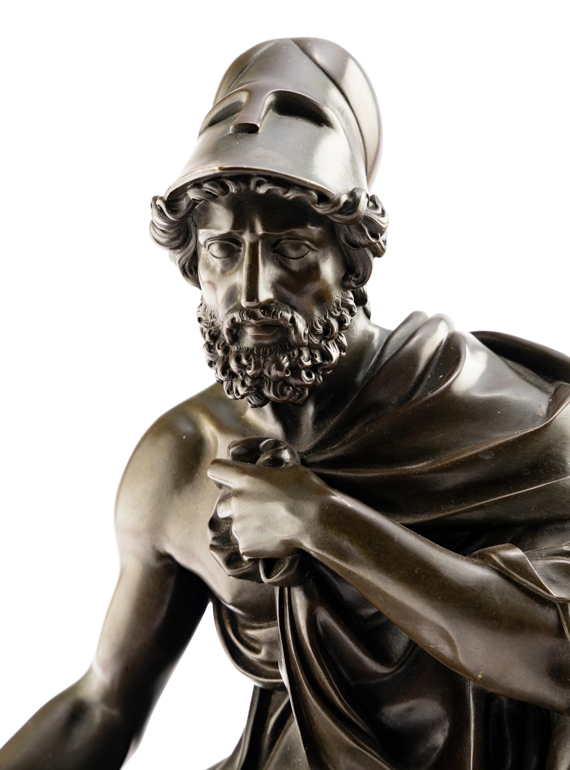 A Louis Philippe Patinated Bronze and Sienna Marble Figural Mantel Clock