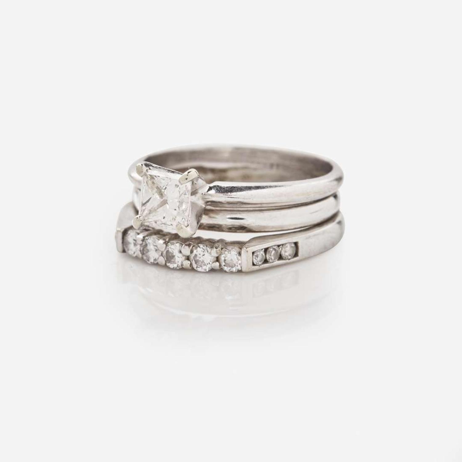 A 14K White Gold and Diamond Ring