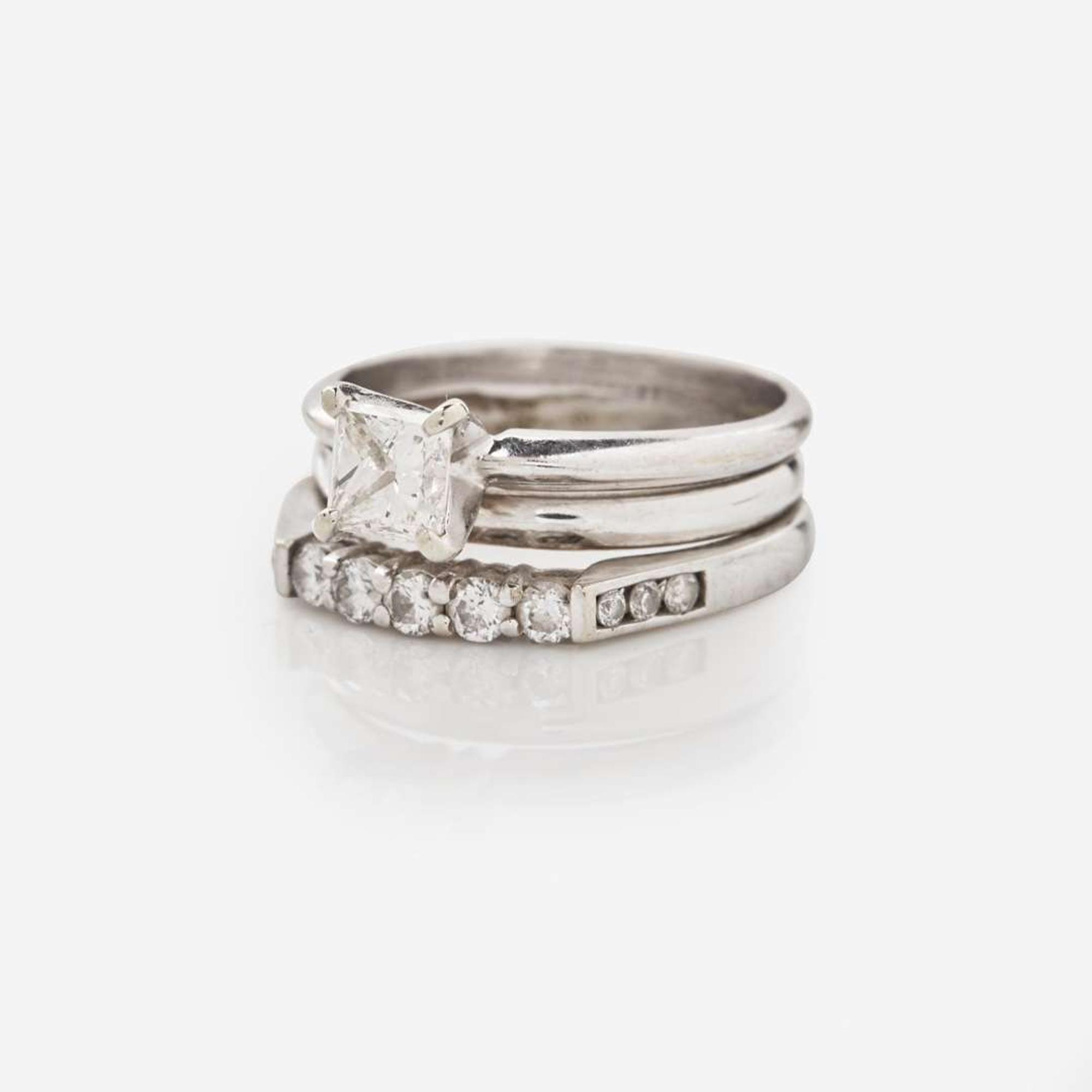A 14K White Gold and Diamond Ring