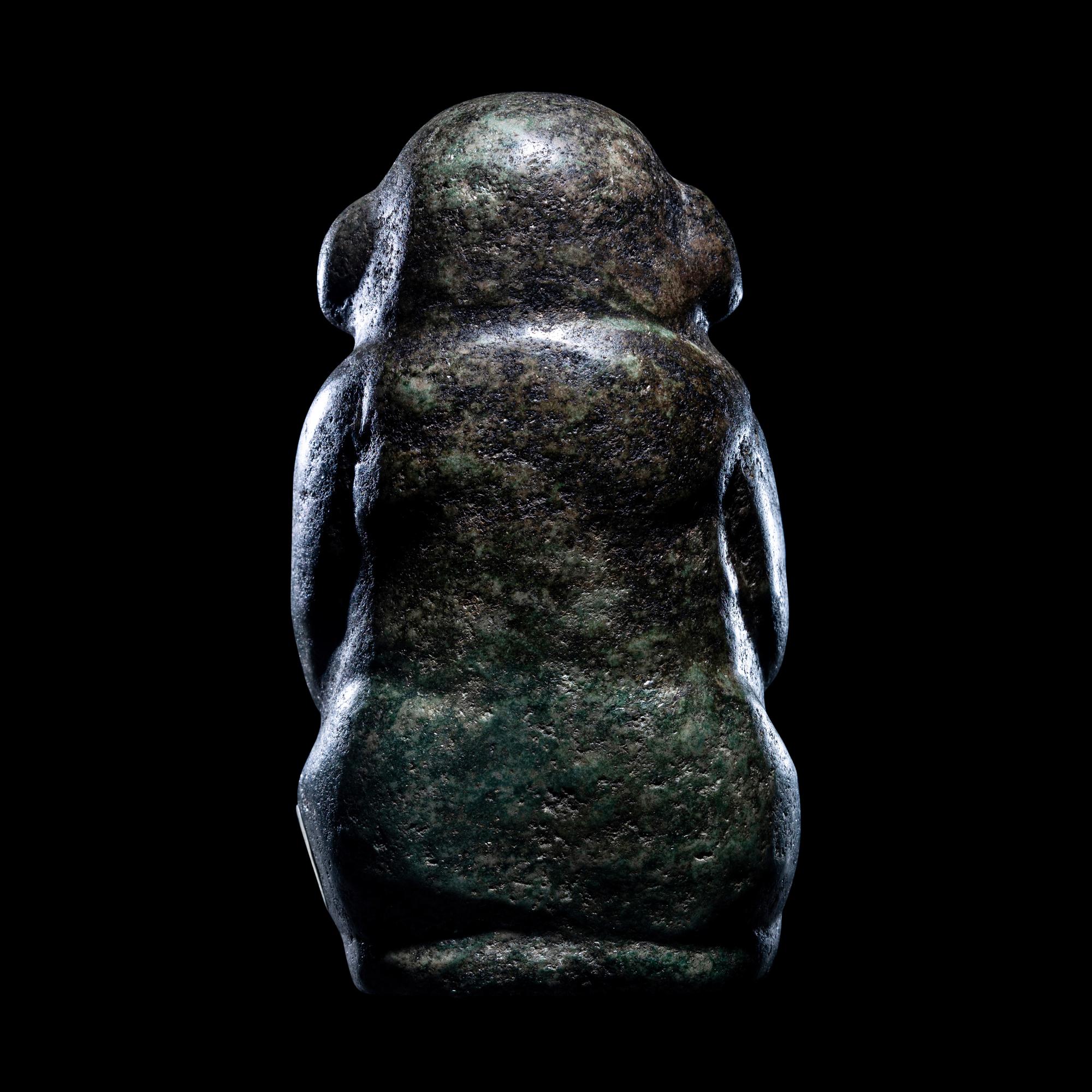 An Early Maya Stone Seated Deity