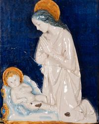 An Italian Glazed Earthenware Plaque of the Madonna and Child
