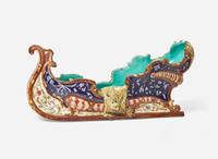 A Wilhelm Schiller & Son Majolica Sleigh-Form Centerpiece, Austria, circa 1900