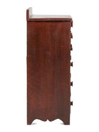 A Classical Grain Painted Nine-Drawer Chest of Drawers