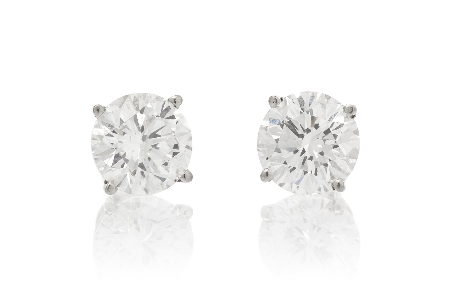 A Pair of White Gold and Diamond Stud Earrings, 1.70 dwts.