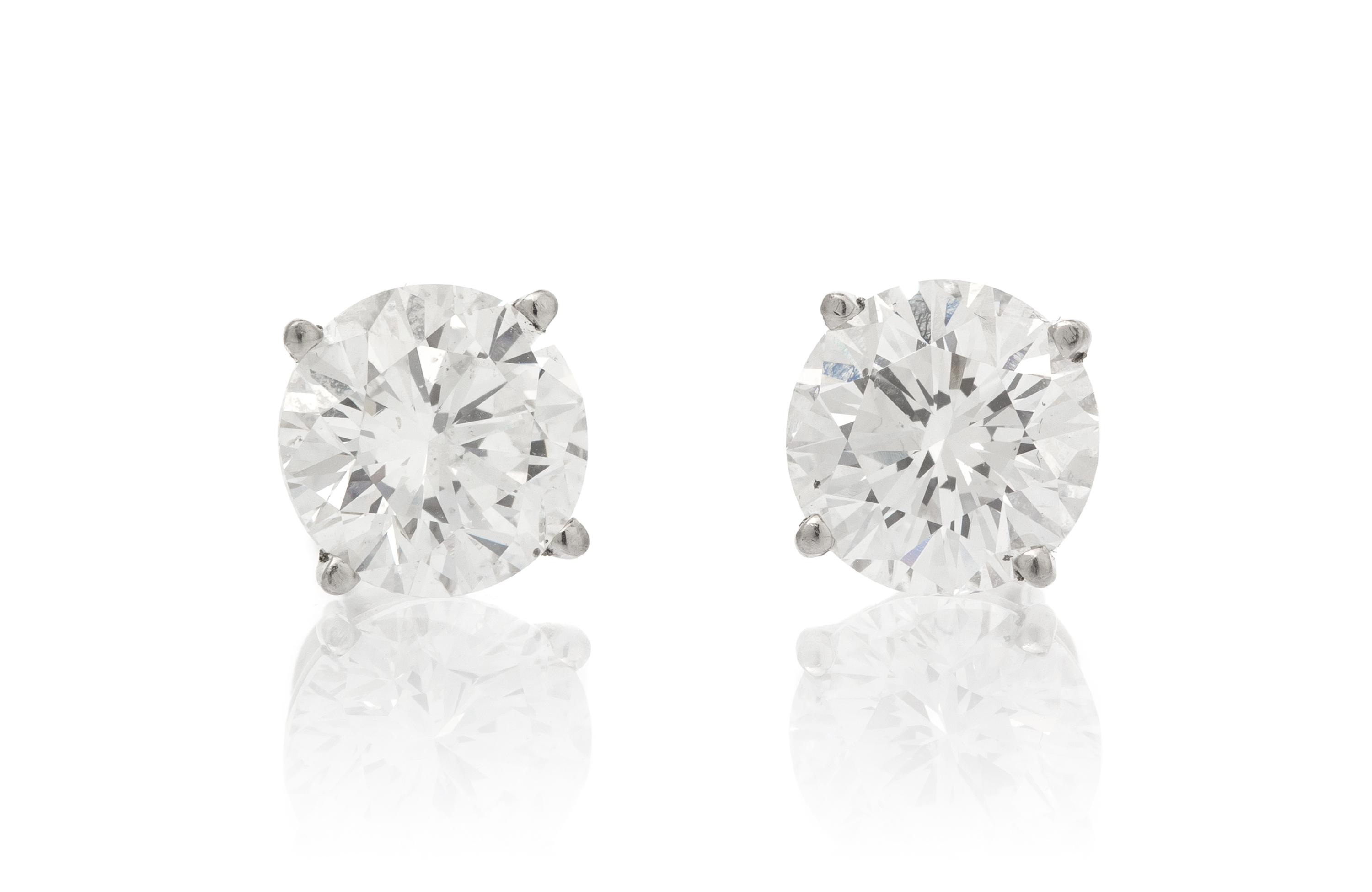 A Pair of White Gold and Diamond Stud Earrings, 1.70 dwts.