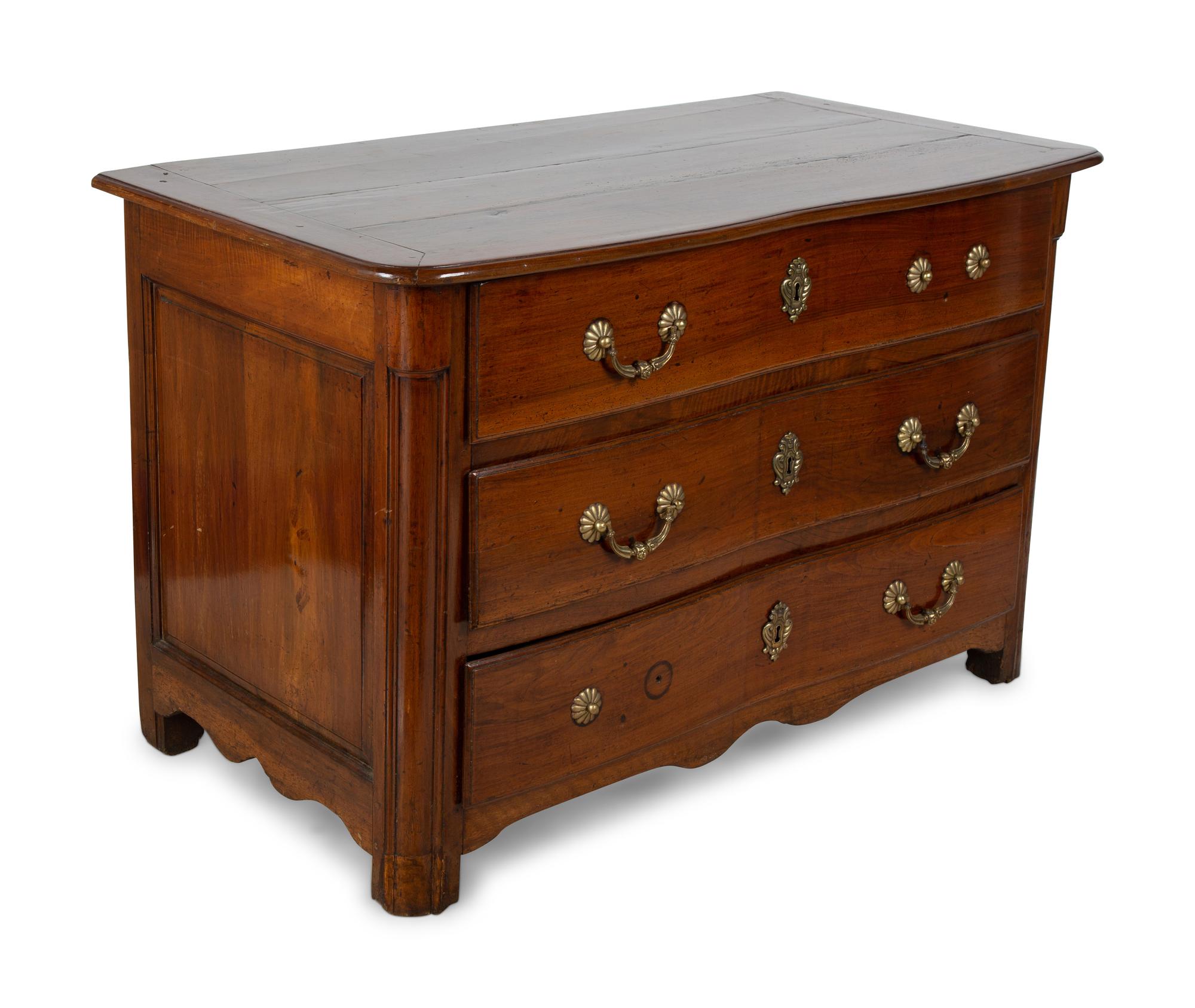 A Louis XV Style Walnut Commode