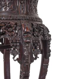A Chinese Export Carved Hardwood Stand, Huaji
