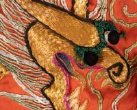 Four Chinese Orange Ground Embroidered Silk Theatrical Articles