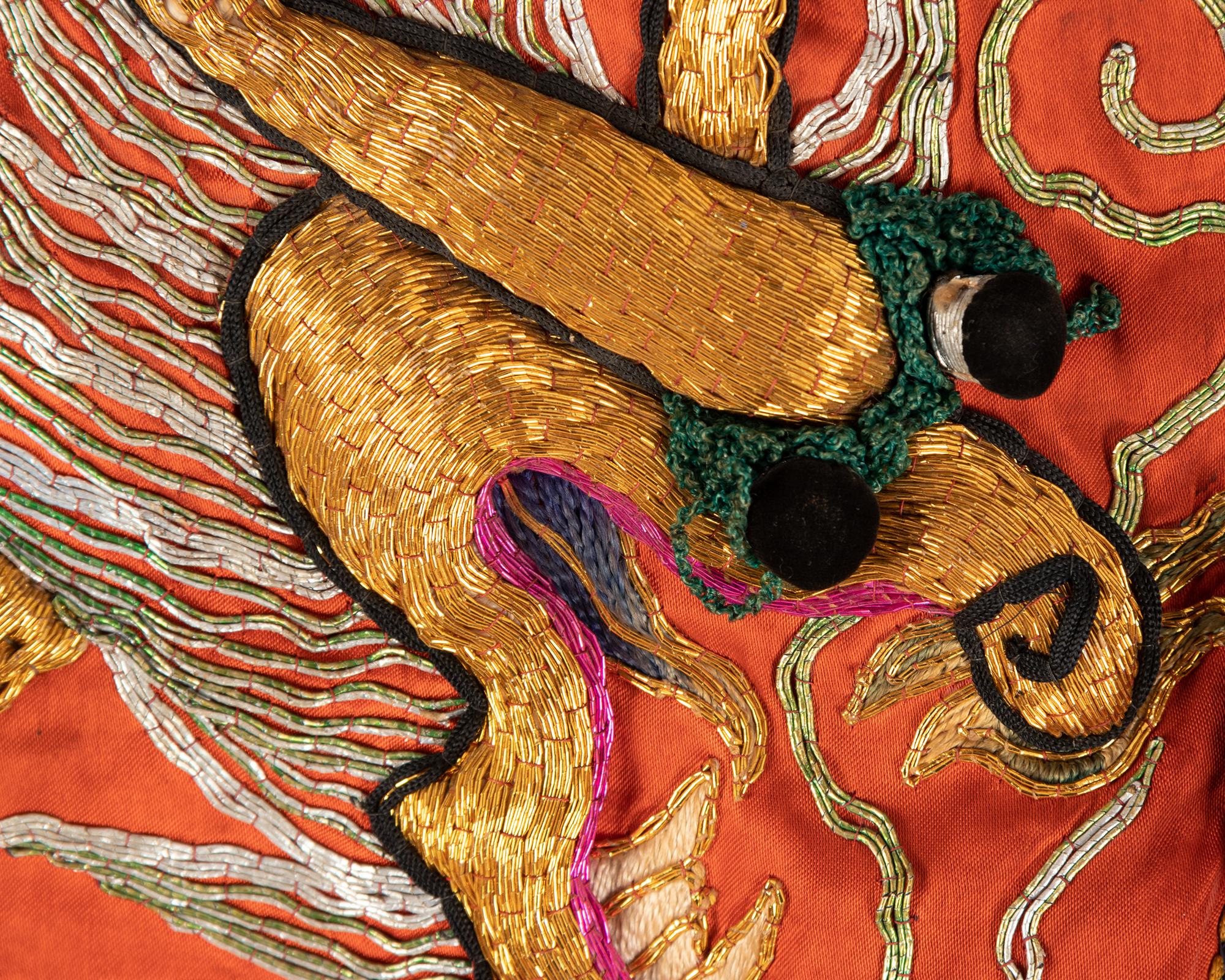 Four Chinese Orange Ground Embroidered Silk Theatrical Articles