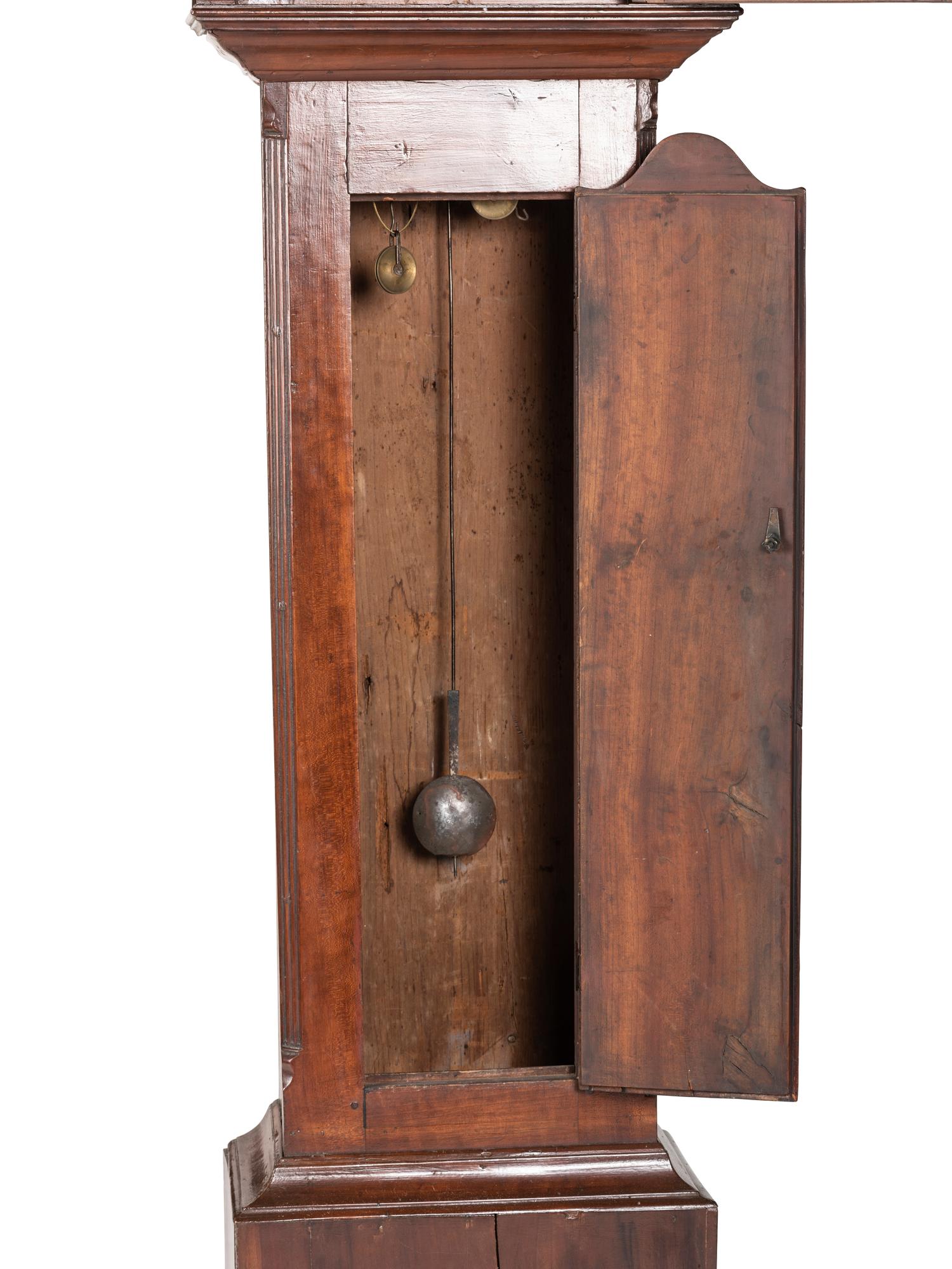 A Federal Carved Cherrywood Tall Case Clock