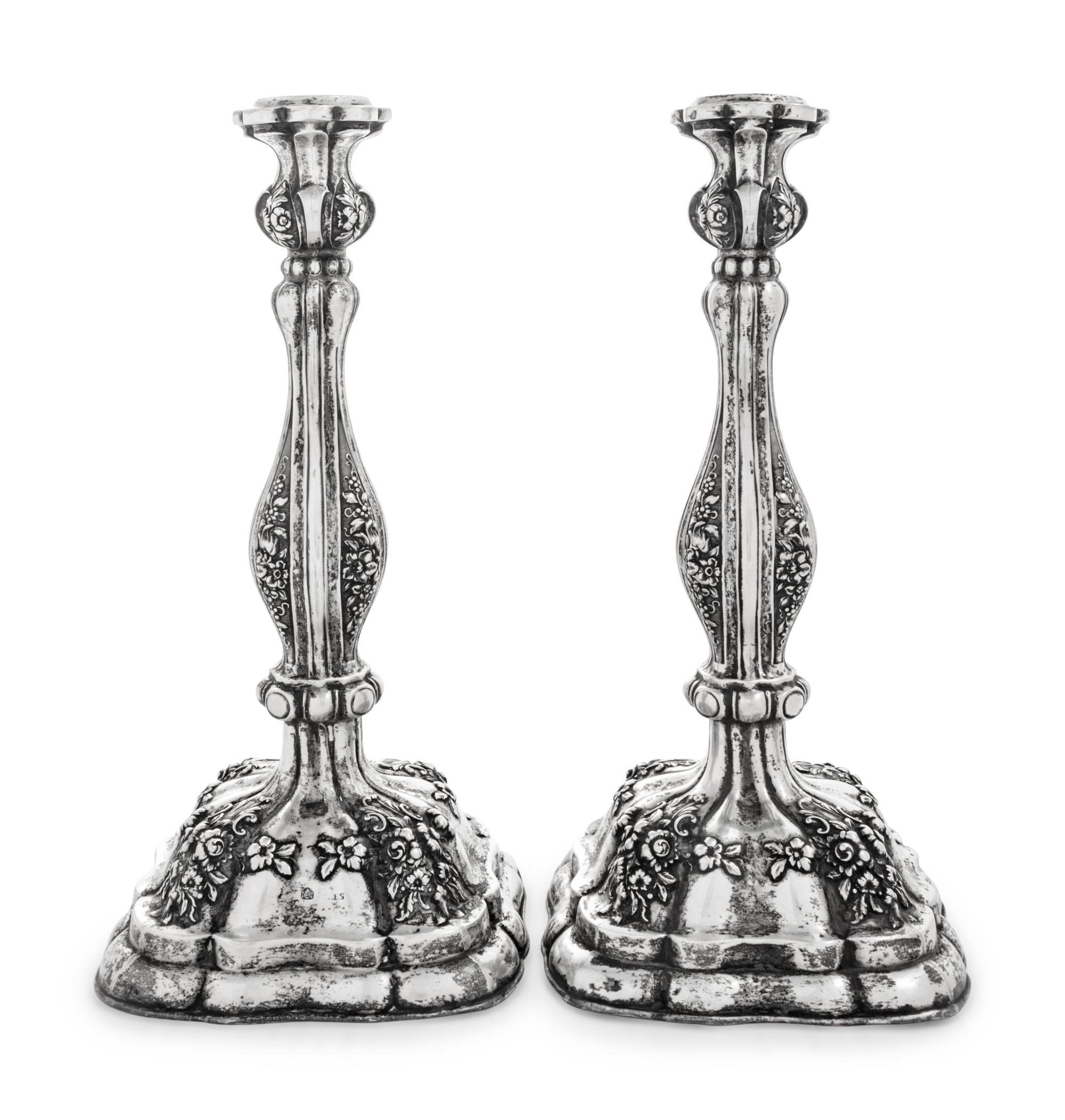 A Pair of Austrian Silver Candlesticks