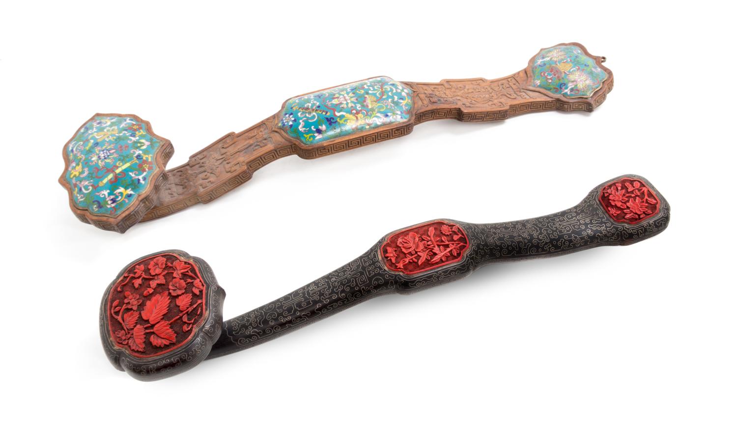 Two Hardwood Ruyi Scepters Length of larger 23 inches. — 20TH CENTURY