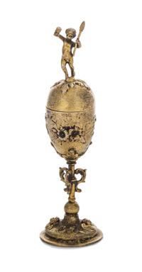 A German Silver-Gilt Diminutive Covered Chalice, 19th Century, of baluster form, the lid with a figural finial in the form of a putto h