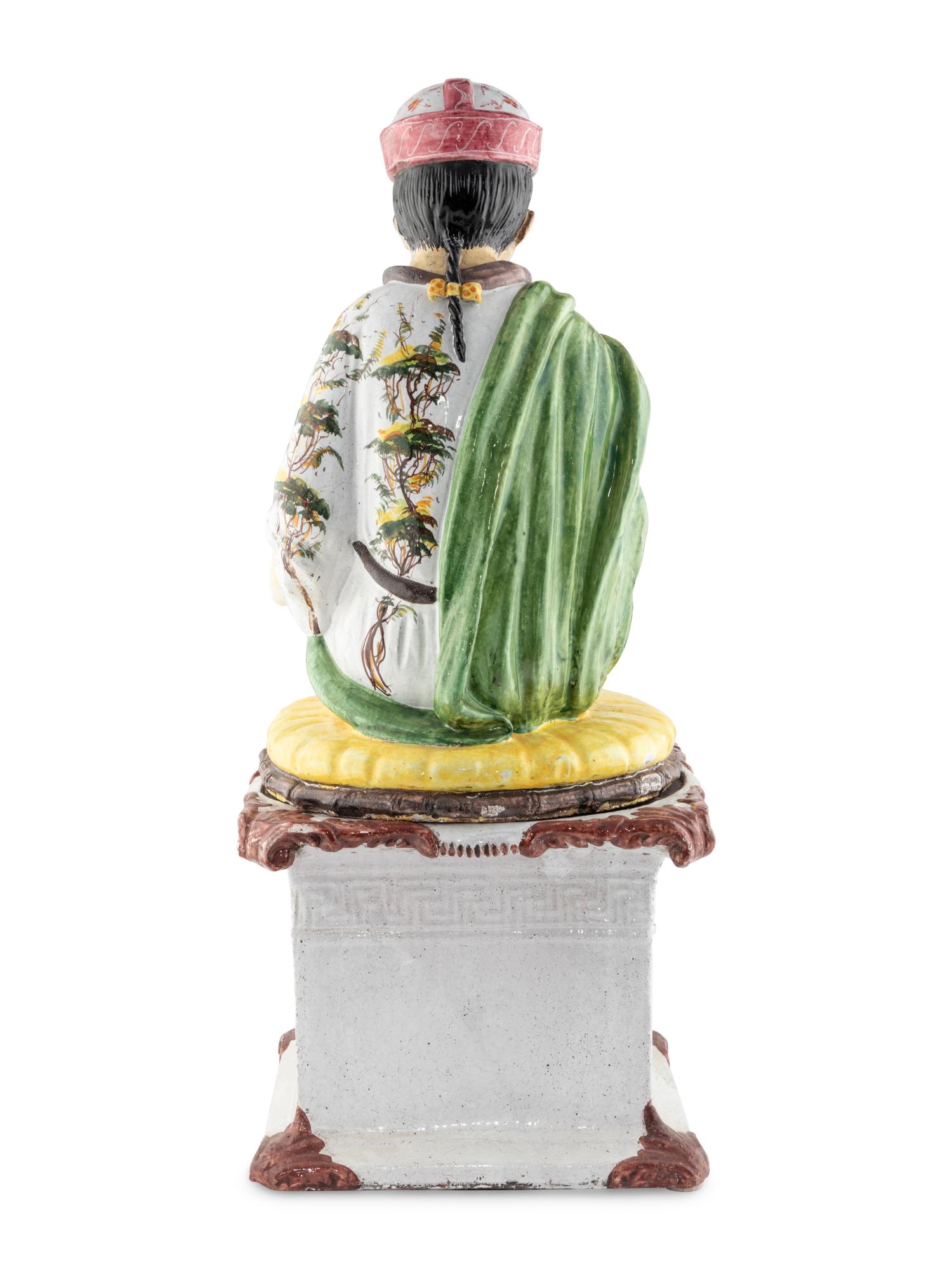 An Italian Polychrome-Glazed Terra Cotta Chinoiserie Figure