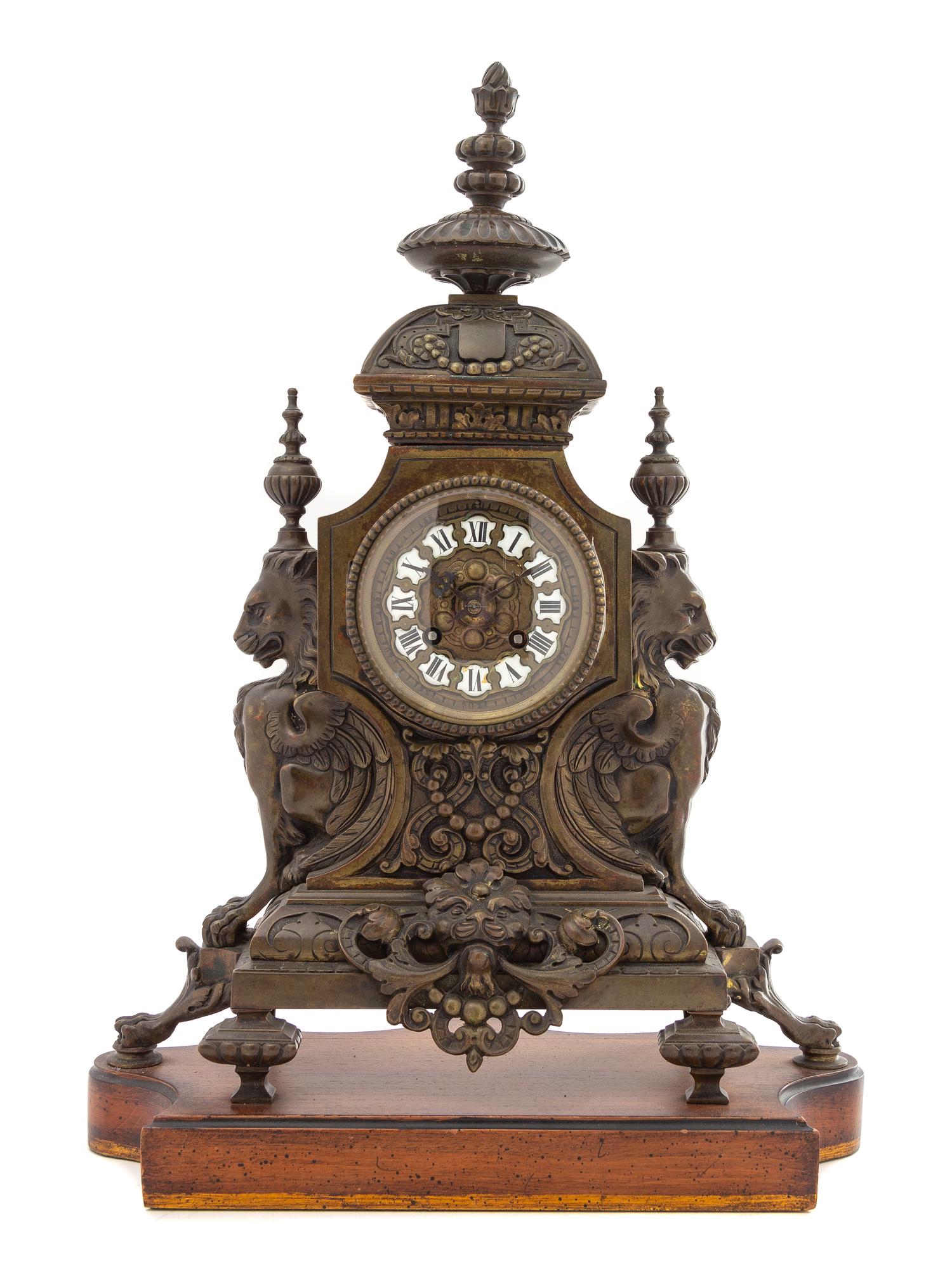A French Neoclassical Bronze Mantel Clock Height 17 x width 14 1/2 x depth 7 1/4 inches. — MOVEMENT STAMPED H&F PARIS, LATE 19TH CENTURY