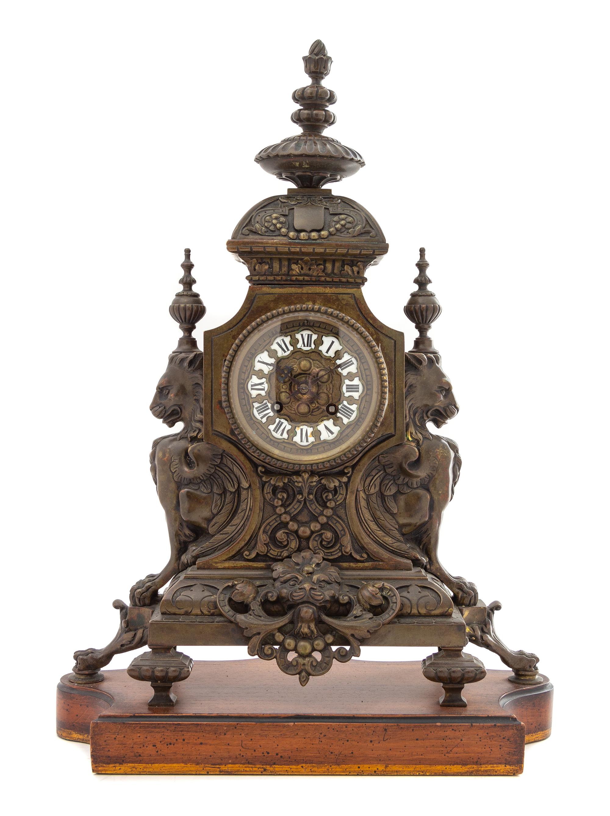 A French Neoclassical Bronze Mantel Clock Height 17 x width 14 1/2 x depth 7 1/4 inches. — MOVEMENT STAMPED H&F PARIS, LATE 19TH CENTURY