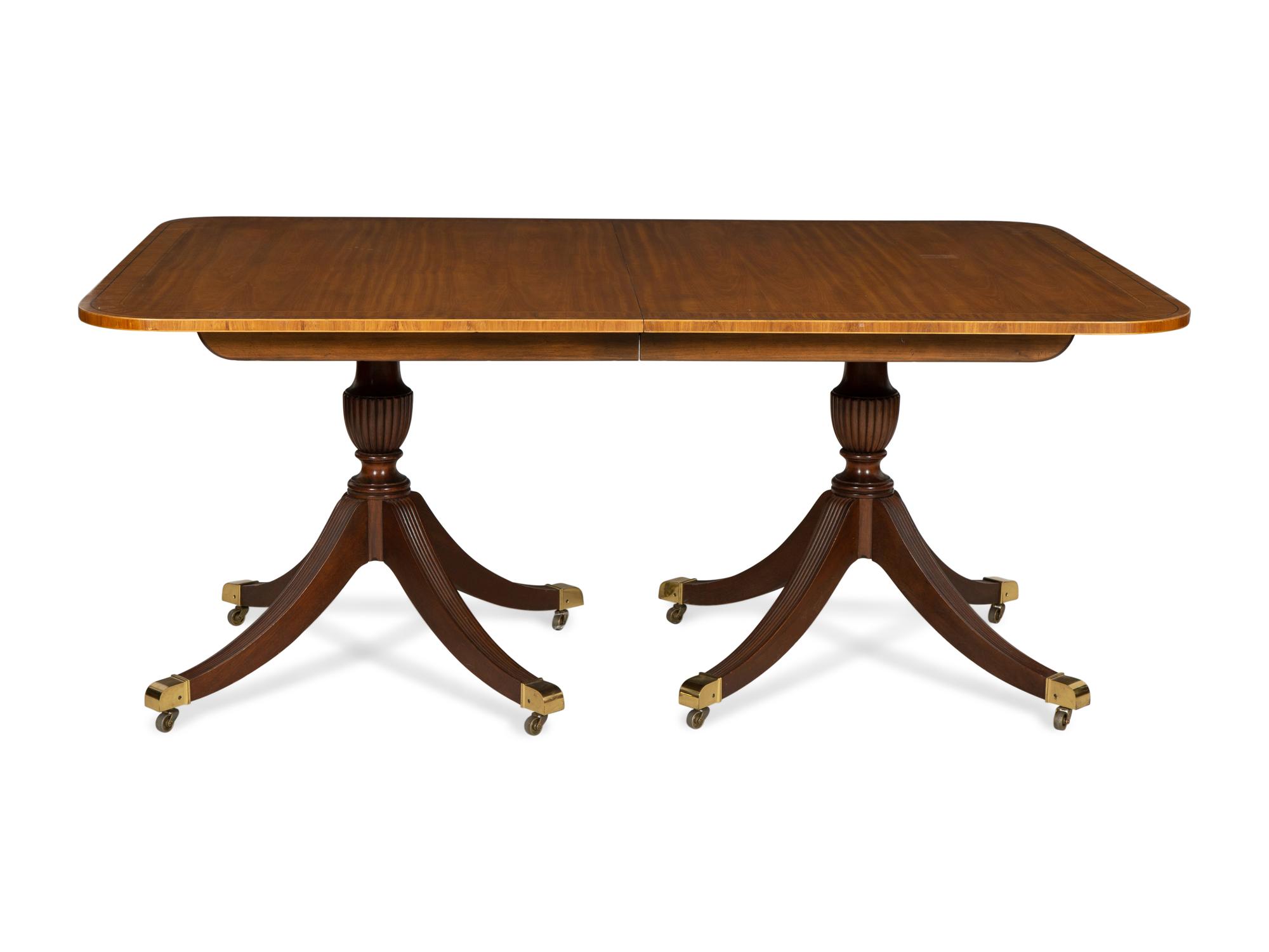 A George III Style Mahogany Double-Pedestal Extension Dining Table