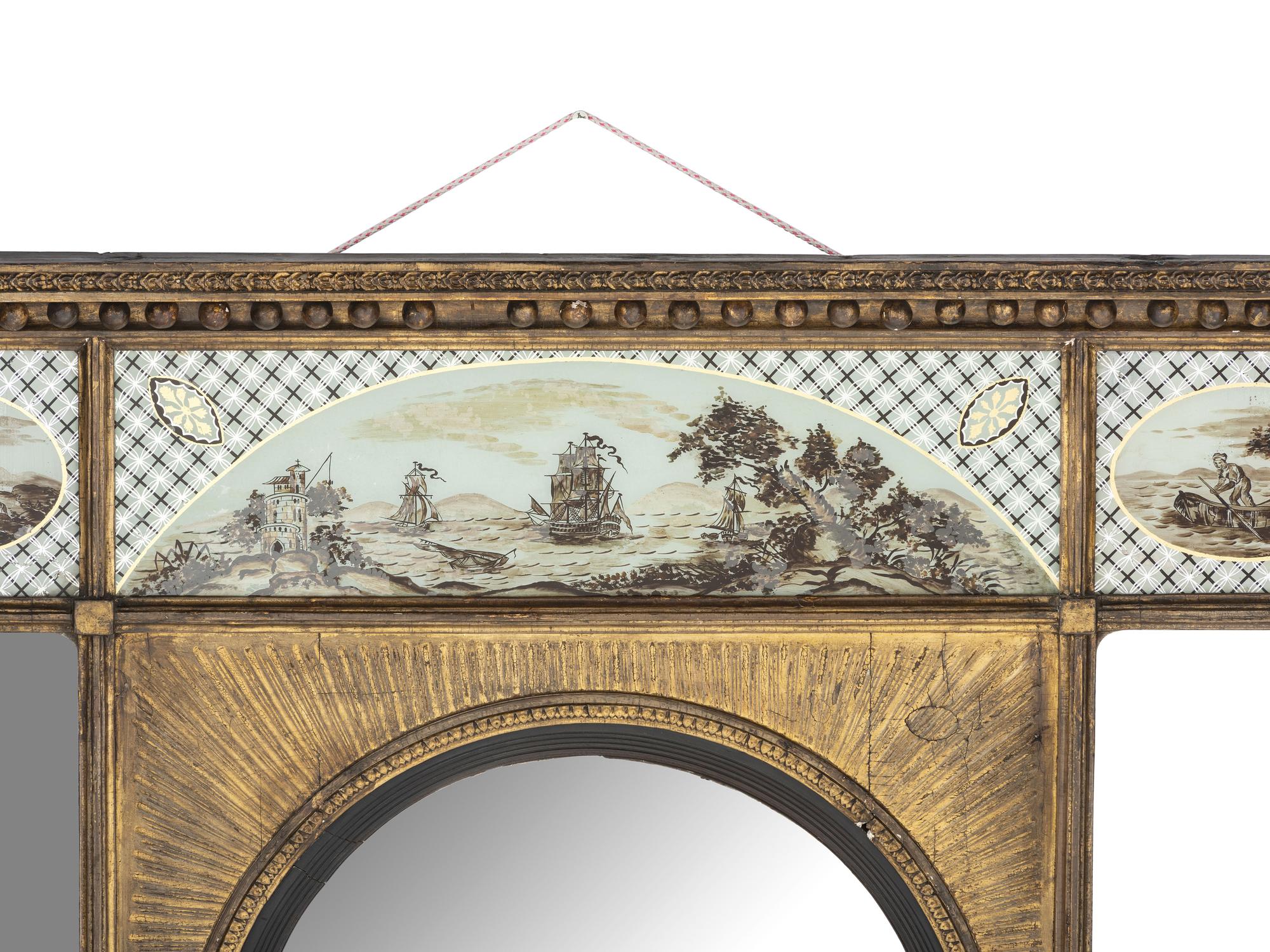 A Classical Giltwood and Eglomise-Inset Mirror