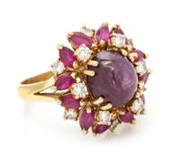 An 18 Karat Yellow Gold, Star Ruby, Ruby and Diamond Ring, 6.30 dwts.
