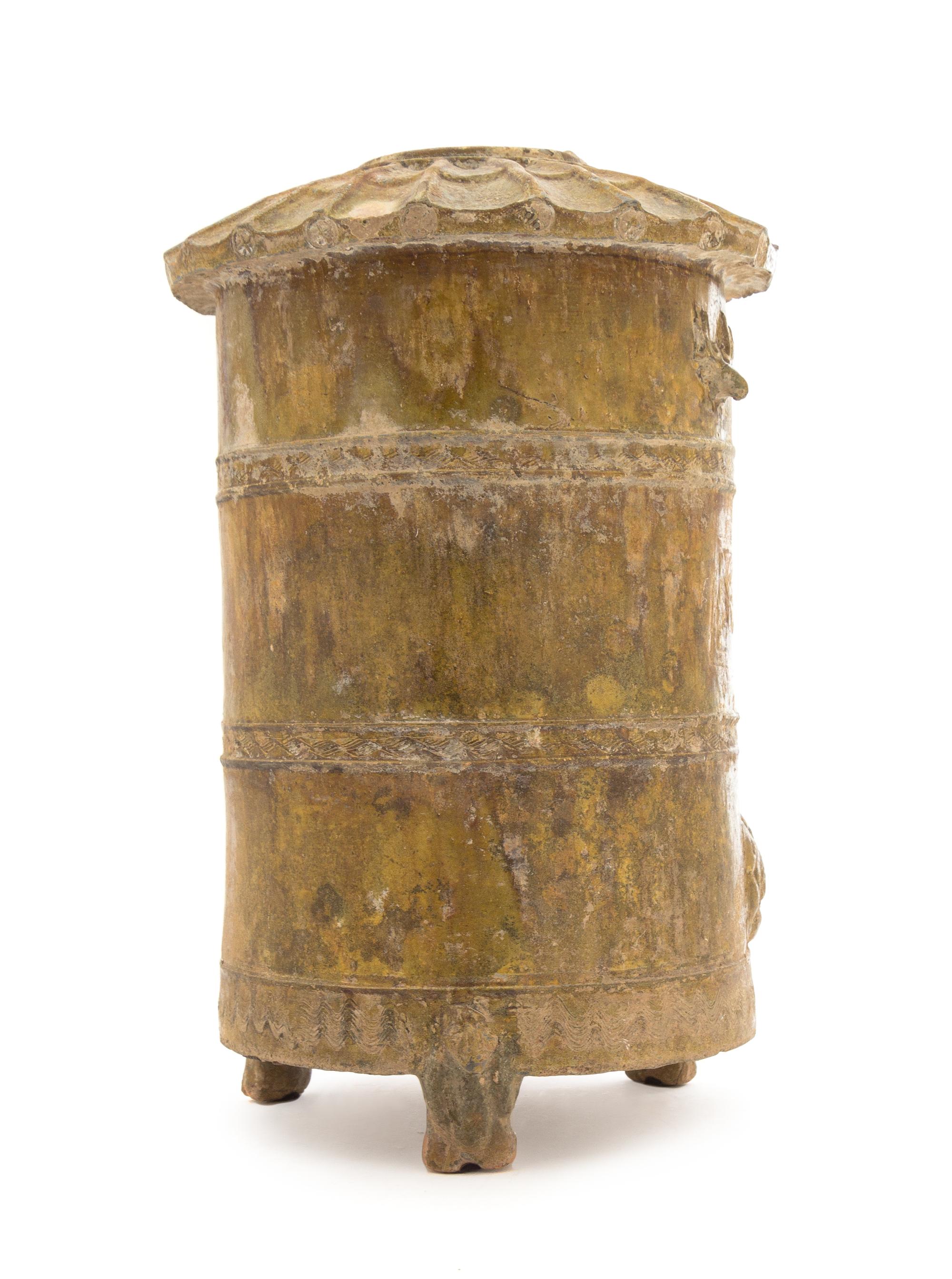 A Chinese Brown Glazed Pottery Granary Height 13 1/2 inches. — HAN DYNASTY (206 B.C. - A.D. 220)