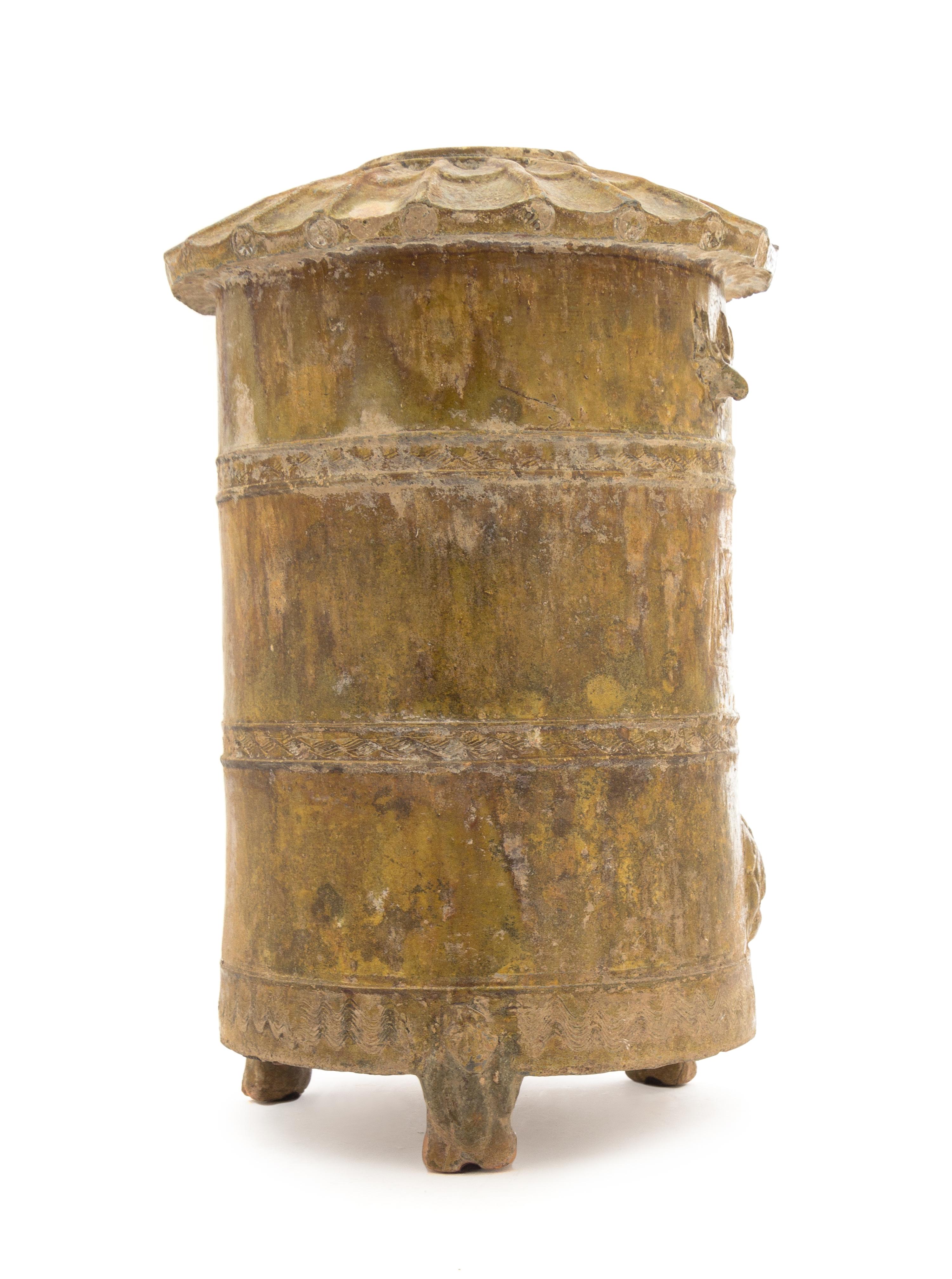 A Chinese Brown Glazed Pottery Granary Height 13 1/2 inches. — HAN DYNASTY (206 B.C. - A.D. 220)