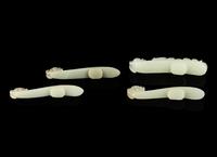 Four Chinese Celadon Jade 'Chilong' Belt Hooks