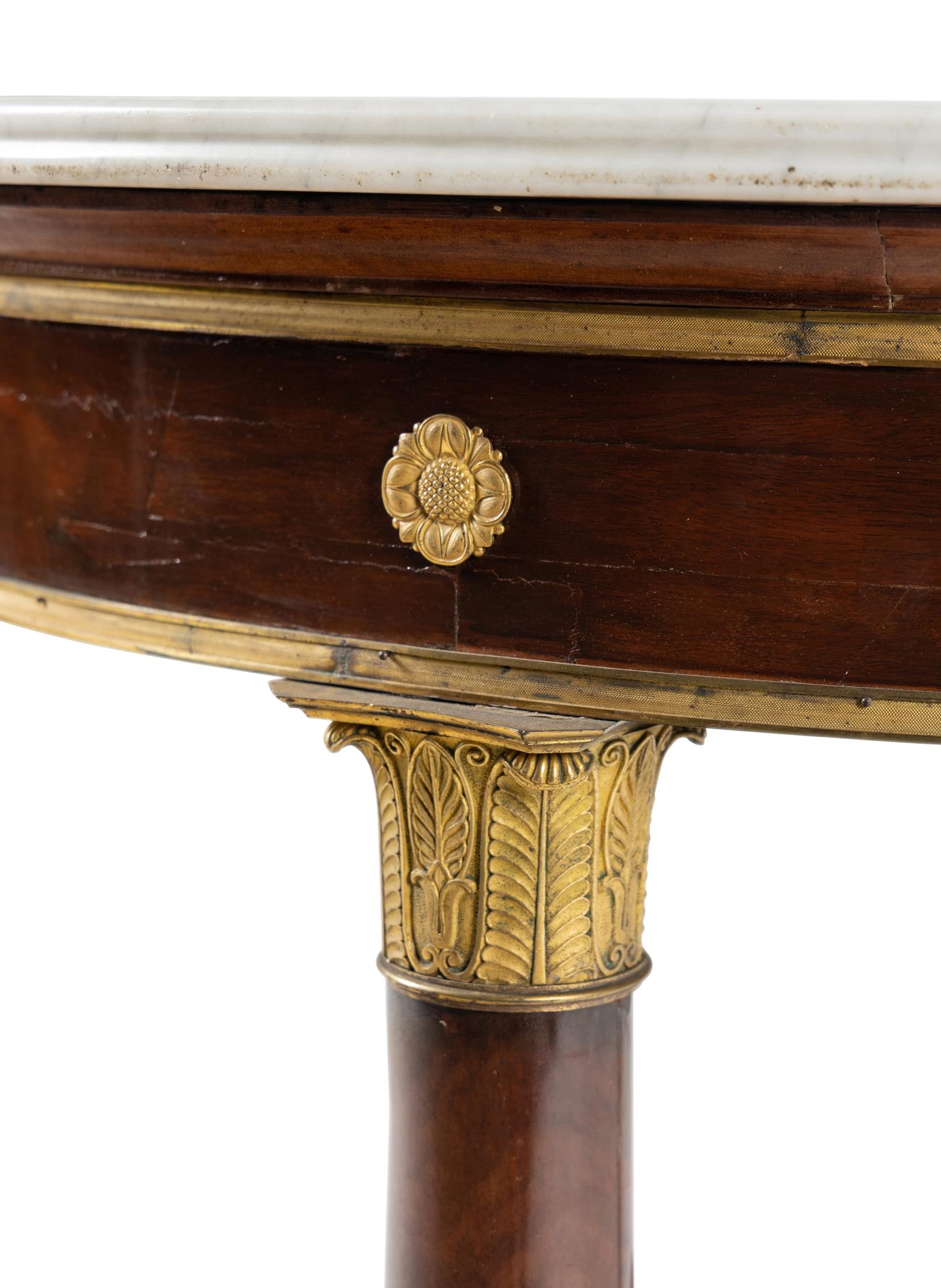 An Empire Style Gilt Bronze Mounted Mahogany Marble-Top Table