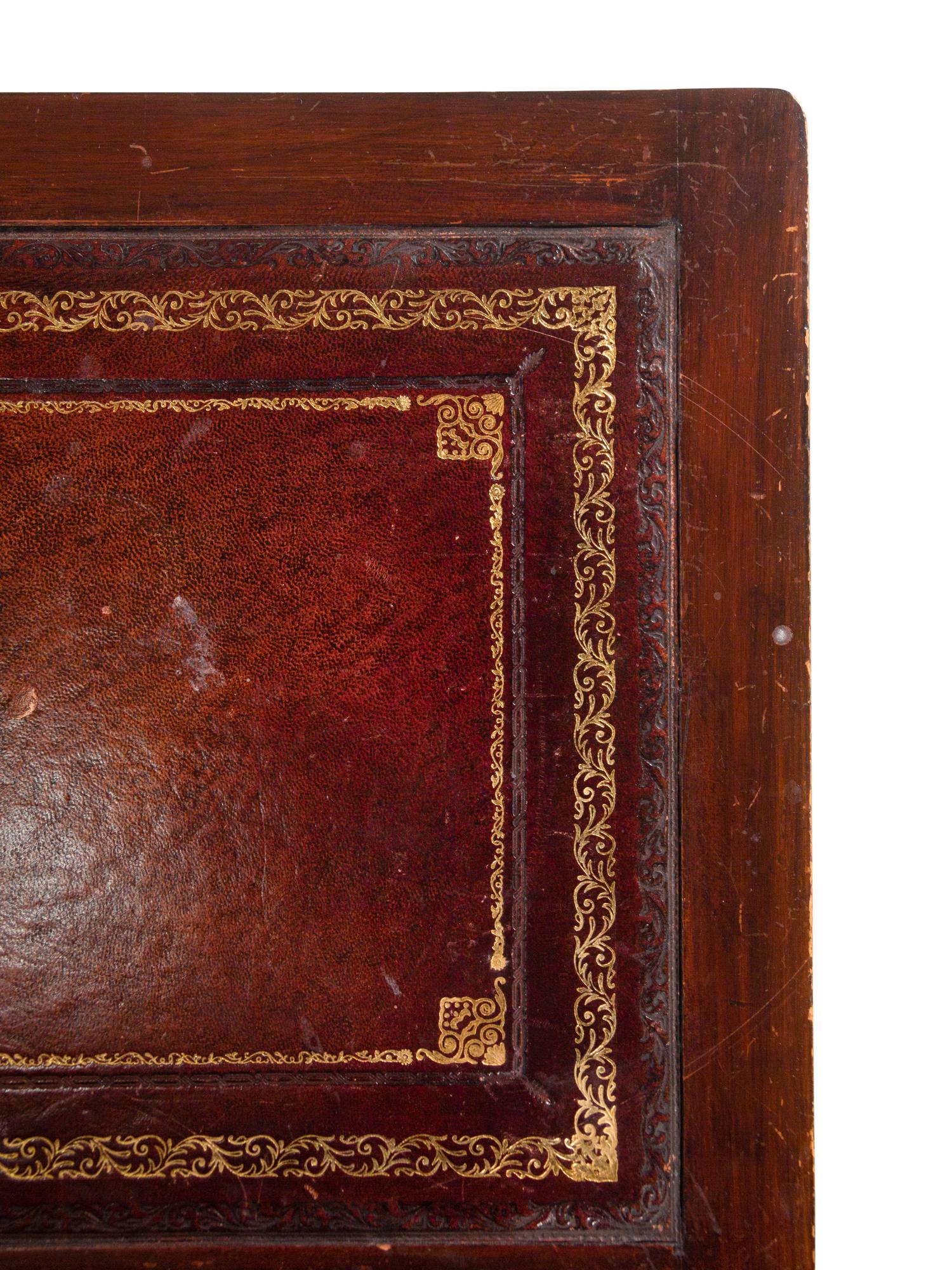 An Edwardian Tooled Leather-Inset Mahogany Partners' Desk