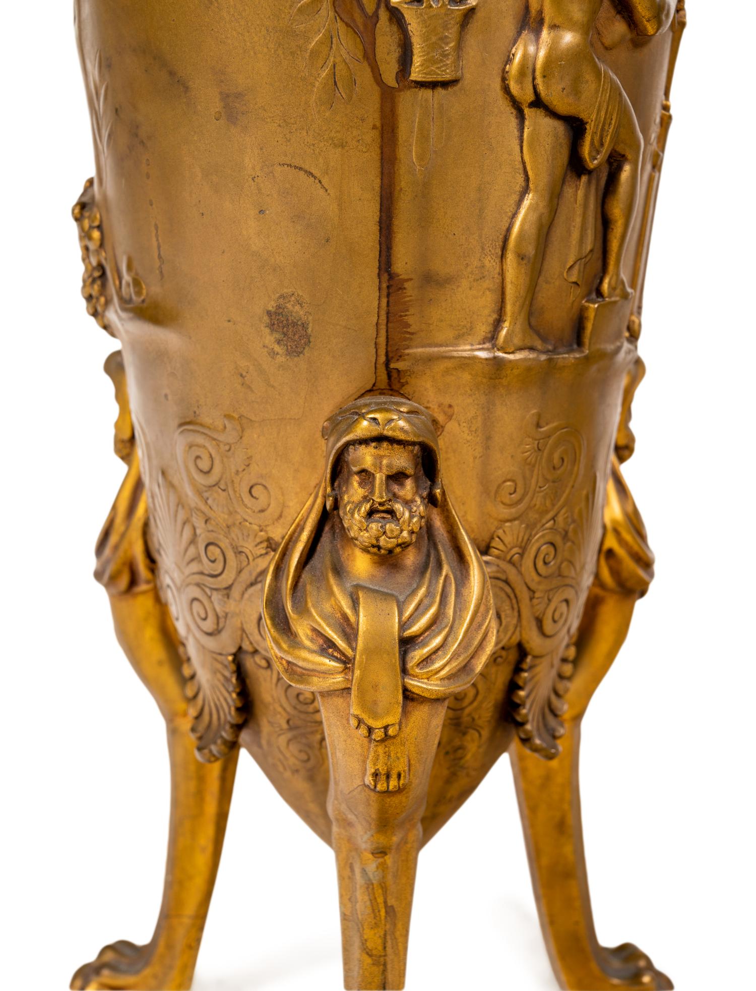 A Pair of French Gilt Bronze Tripod Vases