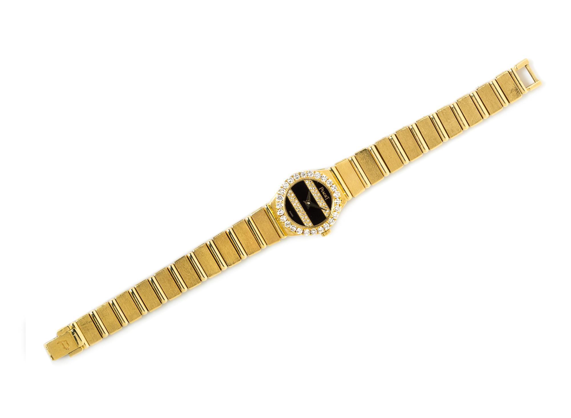 An 18 Karat Yellow Gold, Diamond and Onyx Wristwatch, Piaget, 42.80 dwts.