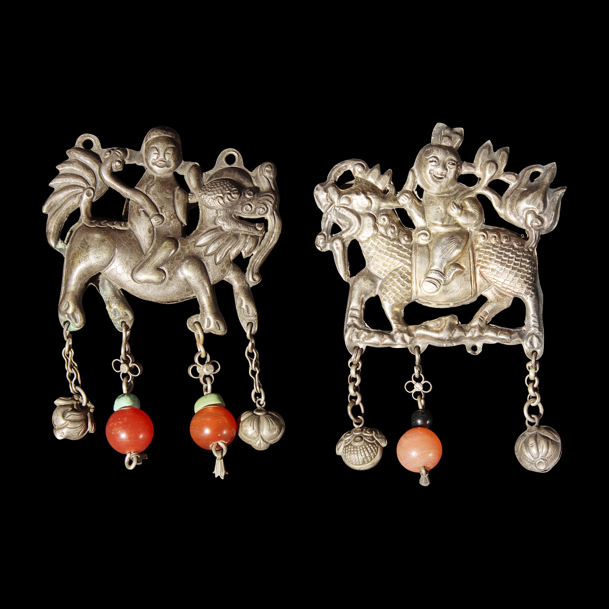 A Group of 10 Assorted Chinese Silver 'Boy and Qilin' Pendants, Late Qing Dynasty-Republic Period 晚清-民國 銀麒麟送子墜瑪瑙長命鎖及其他一組十件